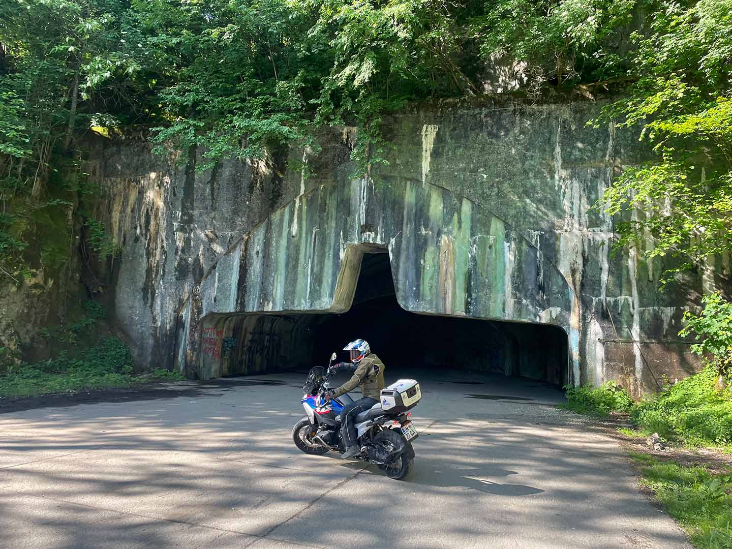 Željava Air Base. The entrance to the tunnels is roughly airplane-shaped.