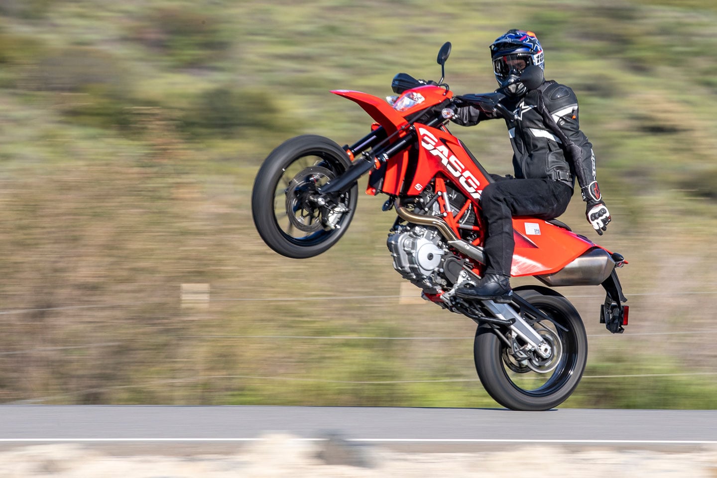 On the GasGas SM 700, wheelies are so easy you only need one hand.