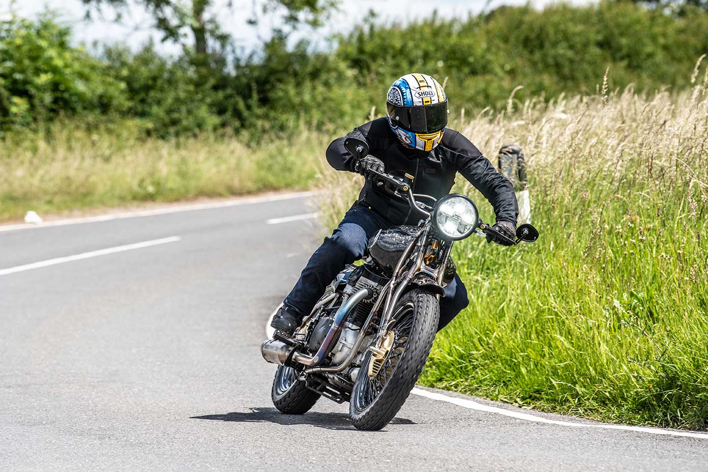 Wide bars put you out in the wind on the Praga ZS 800.