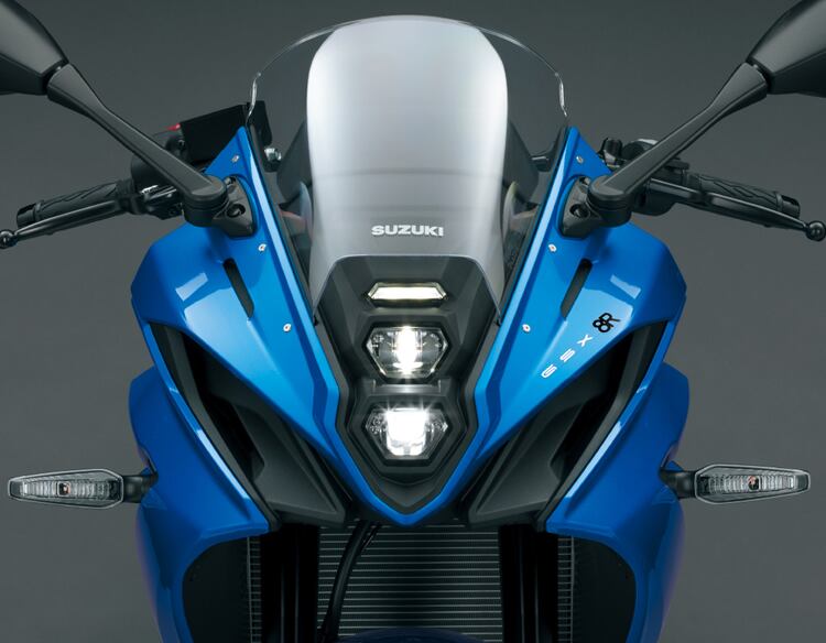 The central LED headlights and fairing intakes share a strong family resemblance with decades of GSX-Rs.