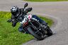 2025 Aprilia Tuono 457 riding on twisty mountain road