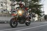 2025 Ducati Hypermotard 698 Mono riding on city street
