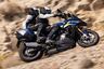 2025 BMW S 1000 XR riding two up on mountain road