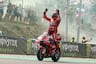Marc Marquez raises hands after winning Brno MotoGP race