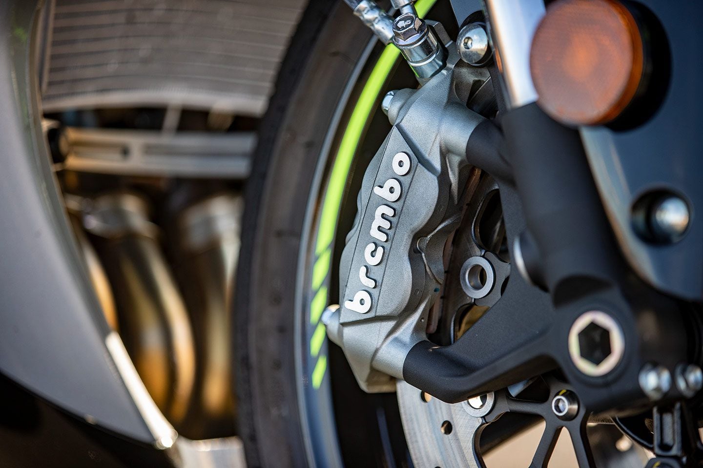 Brembo brakes have decent power but are not incredibly consistent over the course of a session at the racetrack. Upgraded brake pads and lines are a worthwhile addition.