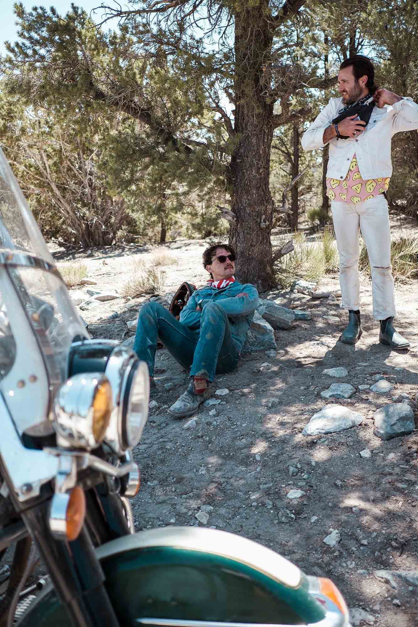 Fox and Drew take a rest under one of the trees along the trailside.