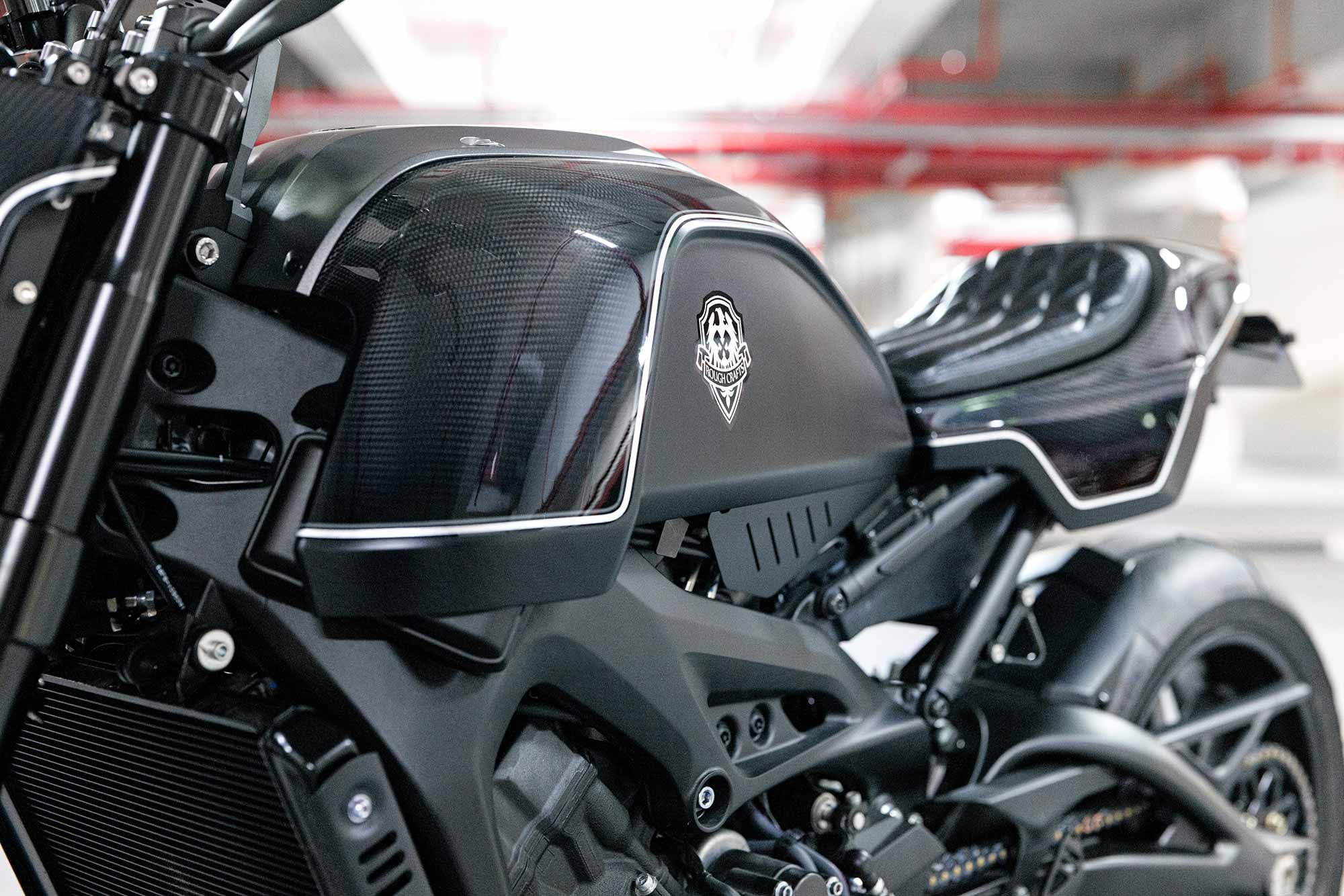 The XSR features a gas tank underneath an outer cover, making it easy for these carbon fiber pieces to bolt right on.
