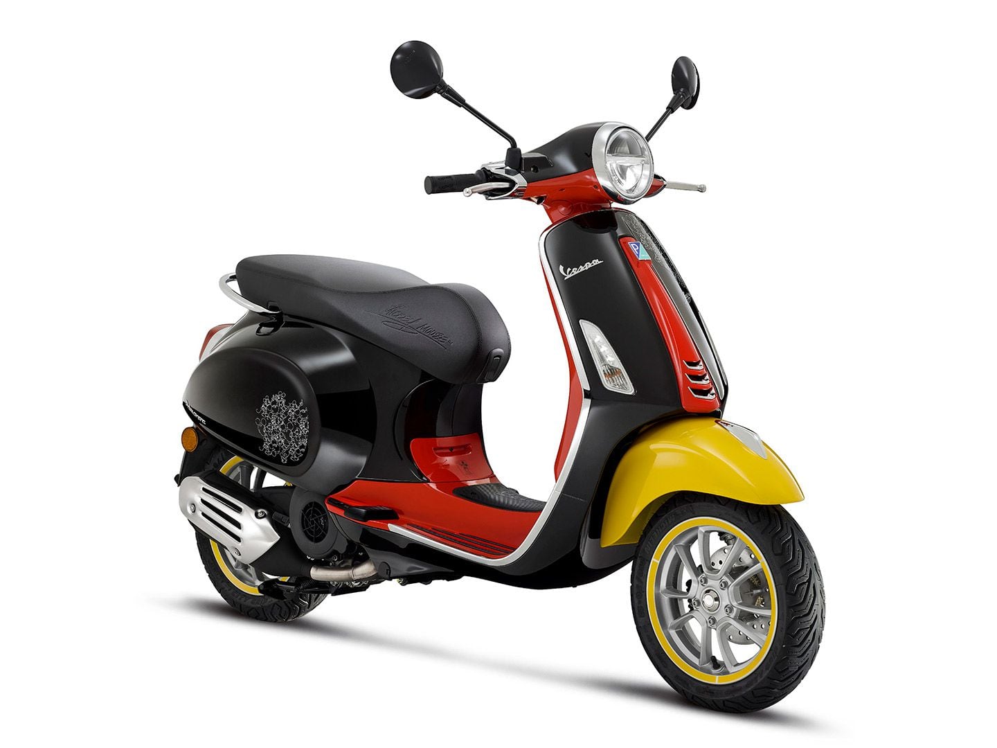Vespa’s new Disney Mickey Mouse Edition scooter gets a color scheme that riffs on the cartoon mouse’s own hues over the years.