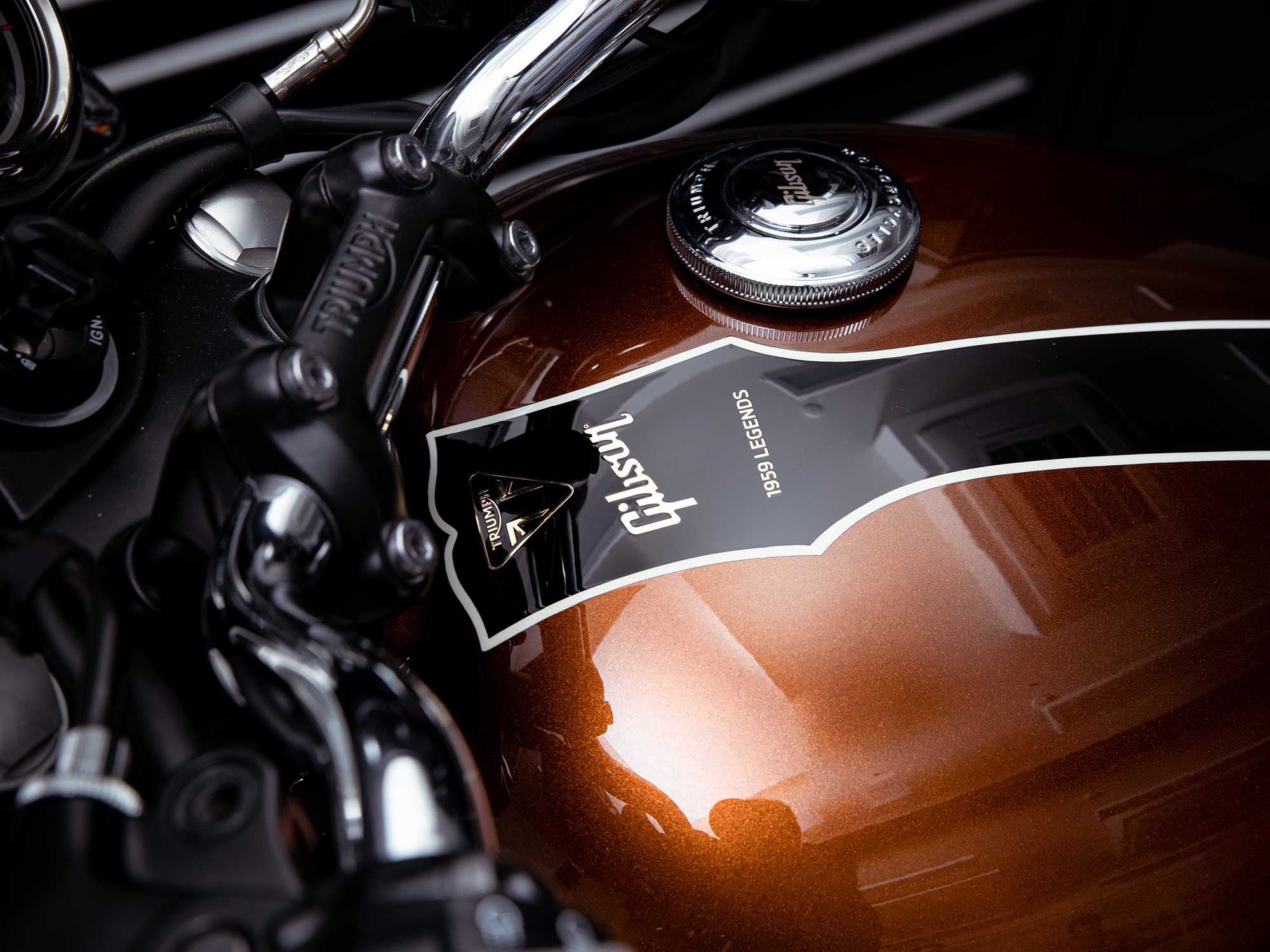 The custom Bonnie’s gas tank features a banner in the shape of a Les Paul guitar neck.