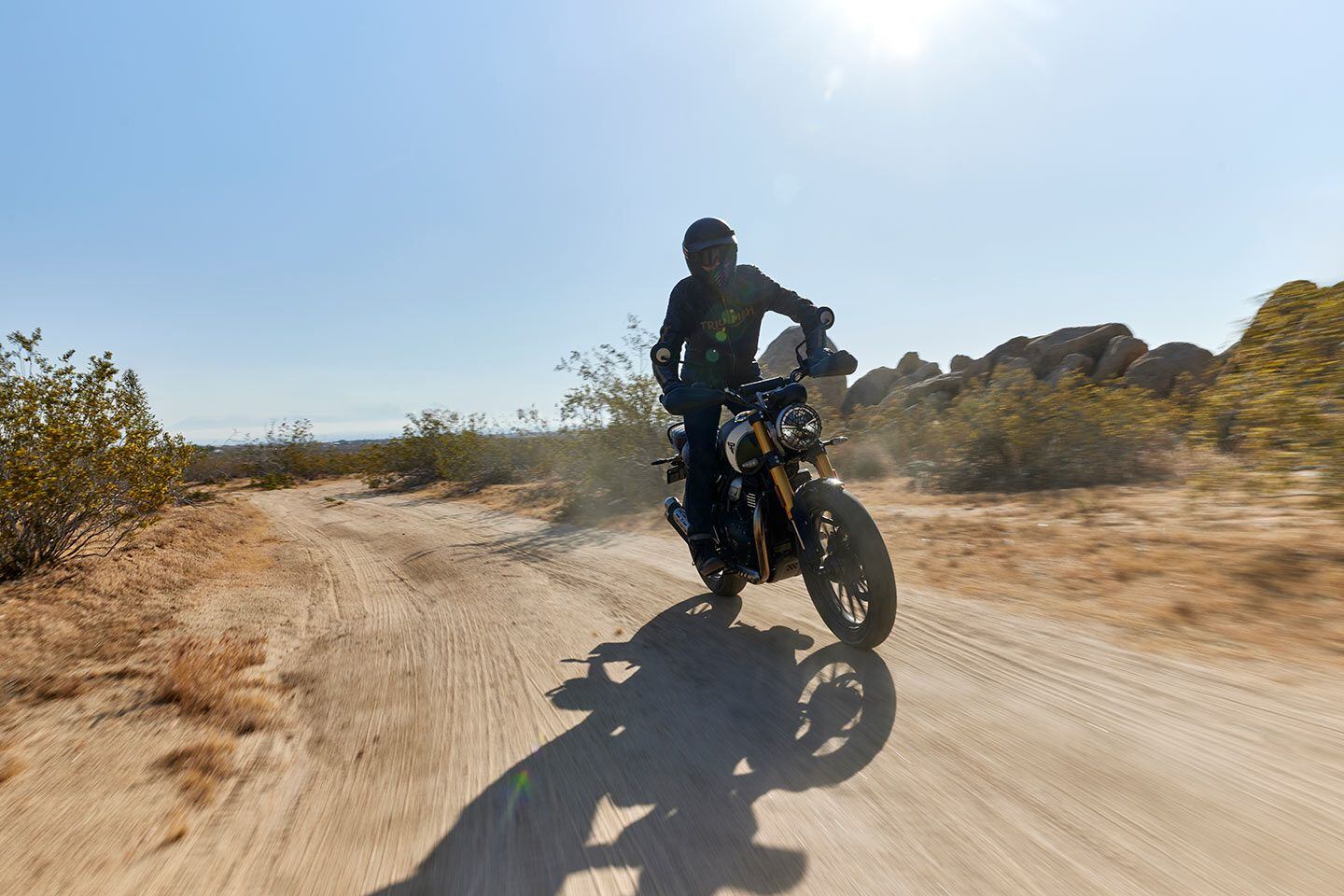 Longer-travel suspension, a bigger front rotor, and Scrambler specific geometry give the Triumph Scrambler 400 X the ability to cope with loose surfaces.