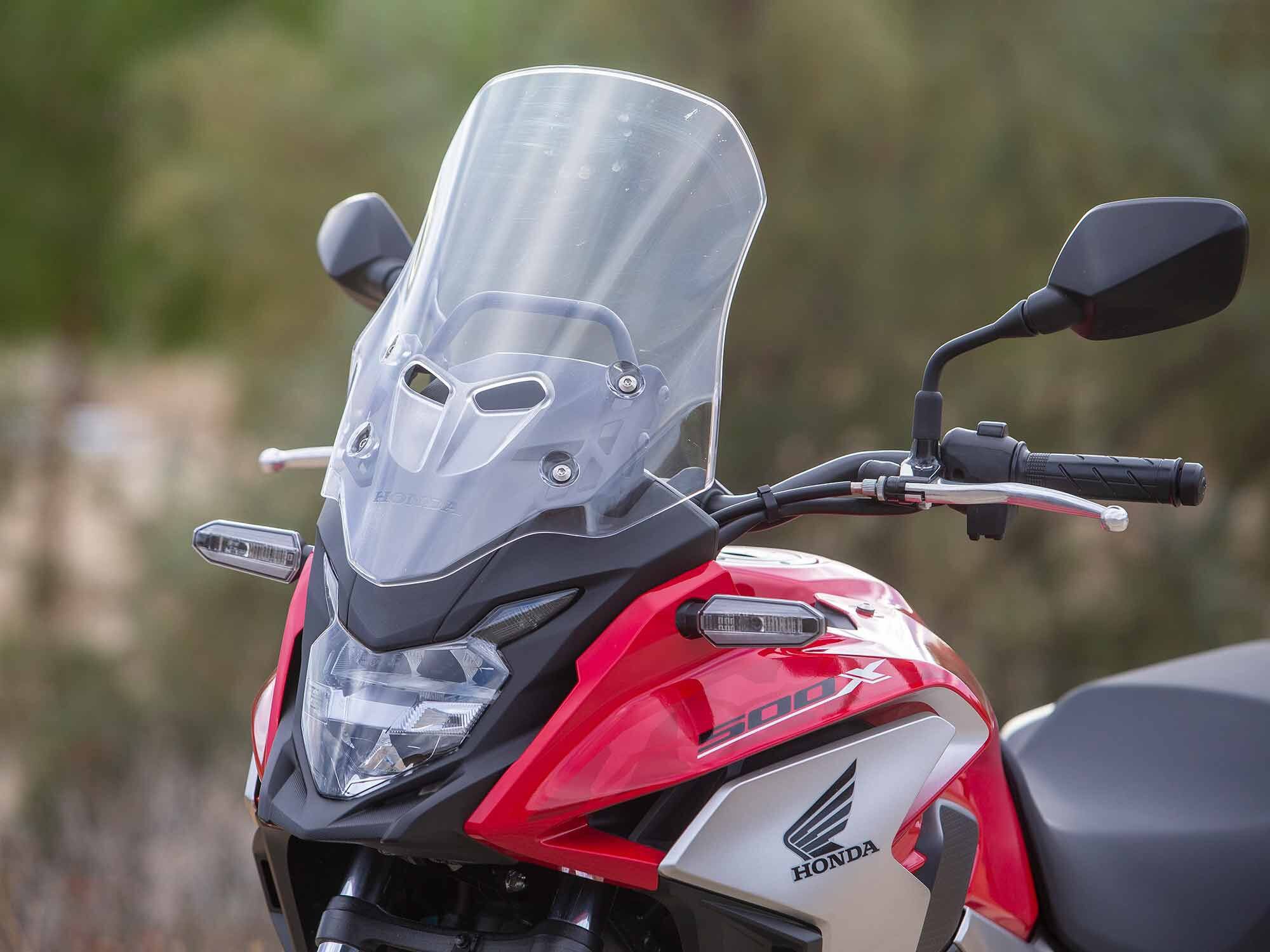 The windshield provides added comfort for the commute, however, giving the mirrors a fist pump is a fairly common occurrence when putting your hands back on the grips at a stoplight.