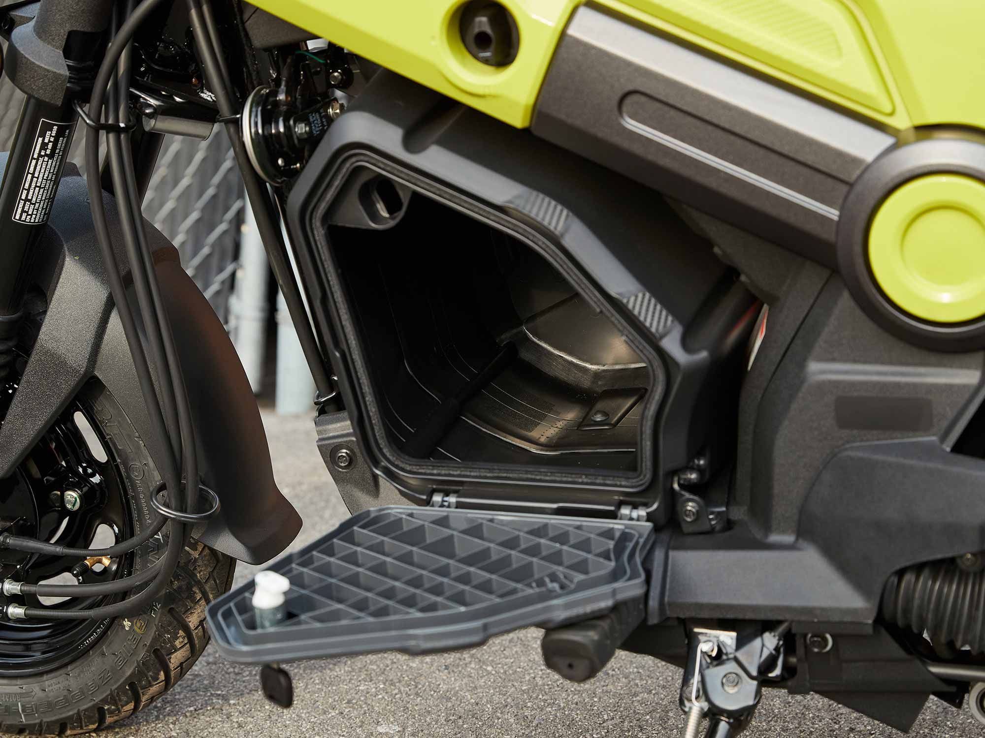 The 15-liter storage compartment is big enough to fit a rolled-up jacket and gloves or a small bag of groceries. Plus it’s water-resistant, keyed to the ignition key, and removable.