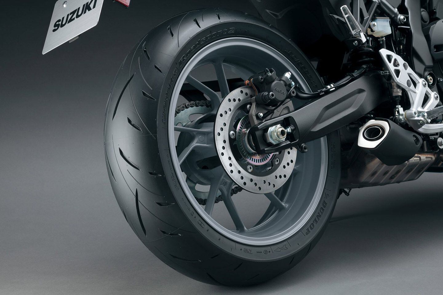 The 8R uses the same wheel and tire package as its naked sibling, but the shock is now a Showa unit.