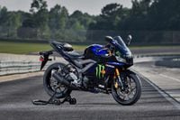 2021 yamaha yzf r3 monster energy yamaha motogp edition parked on the track