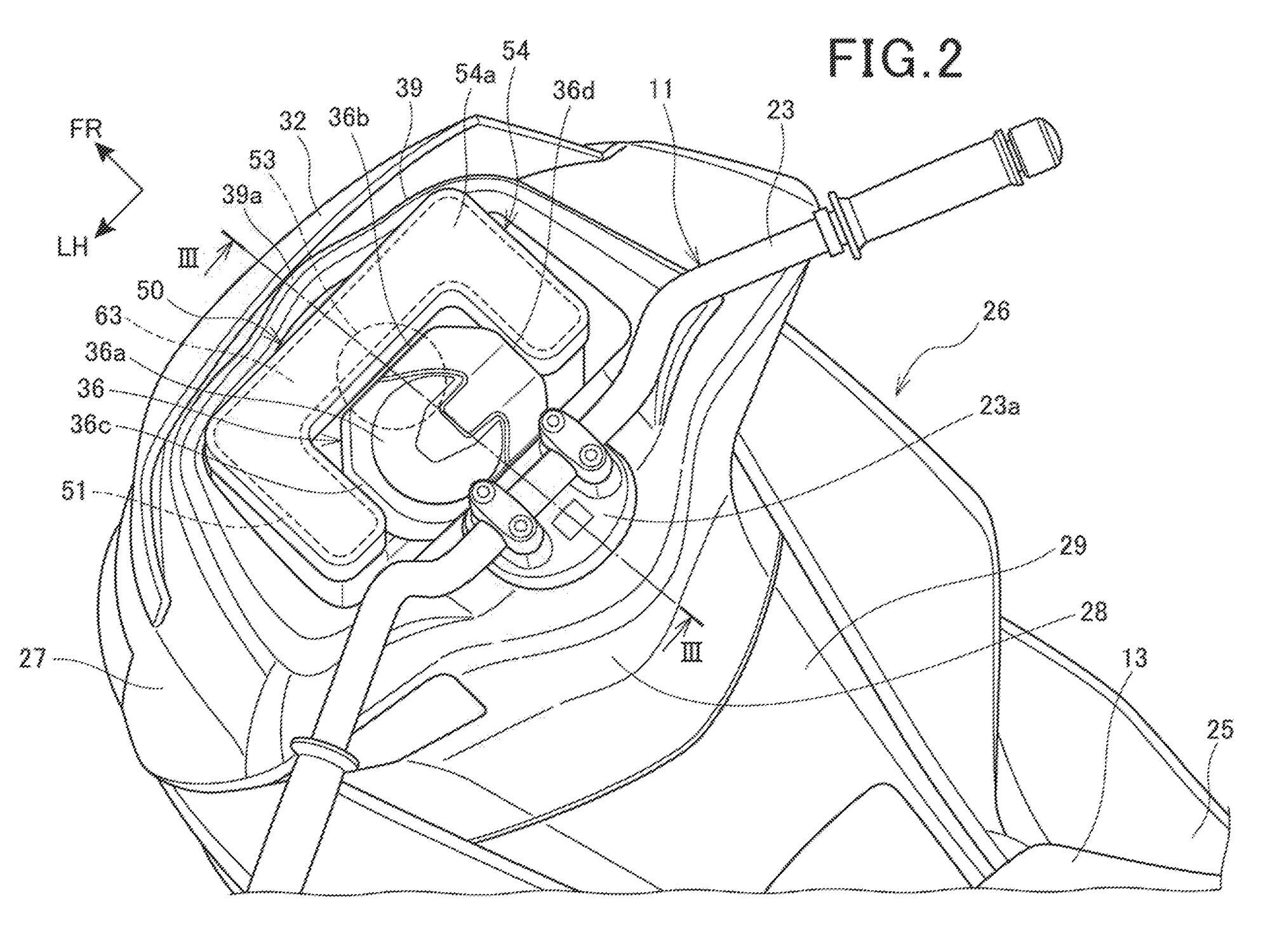 One of the new patents shows the positioning of the bag just north of the instrument panel on a PCX-style scooter.